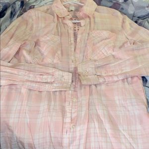 A long sleeve plaid button up